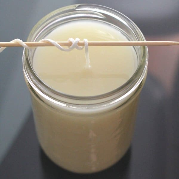 a candle with the wick on a skewer