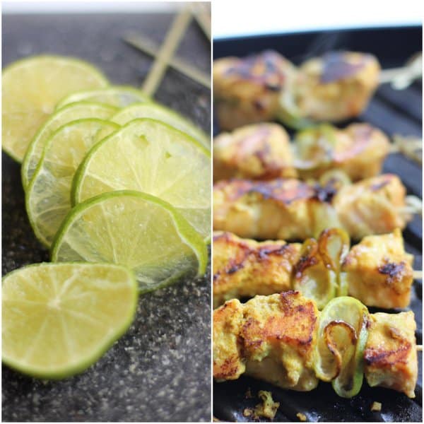 lime slices and salmon skewers on a grey countertop